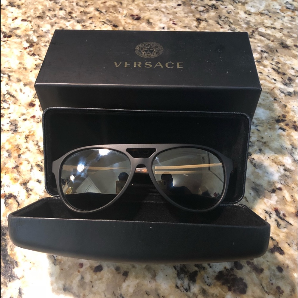Versace sunglasses with the leather case and box